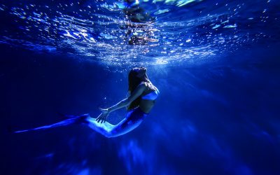 Freediver girl with the mermaid tale
